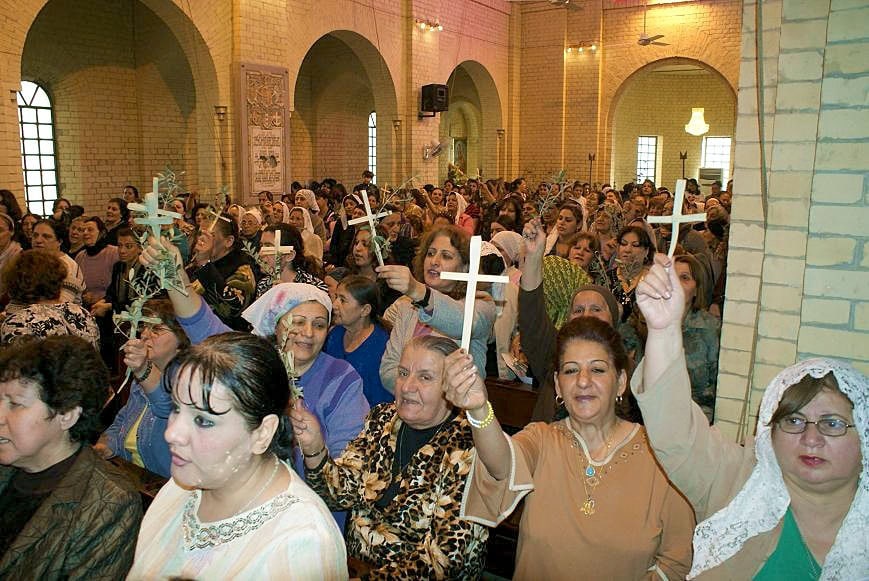 congregation waving crosses b
